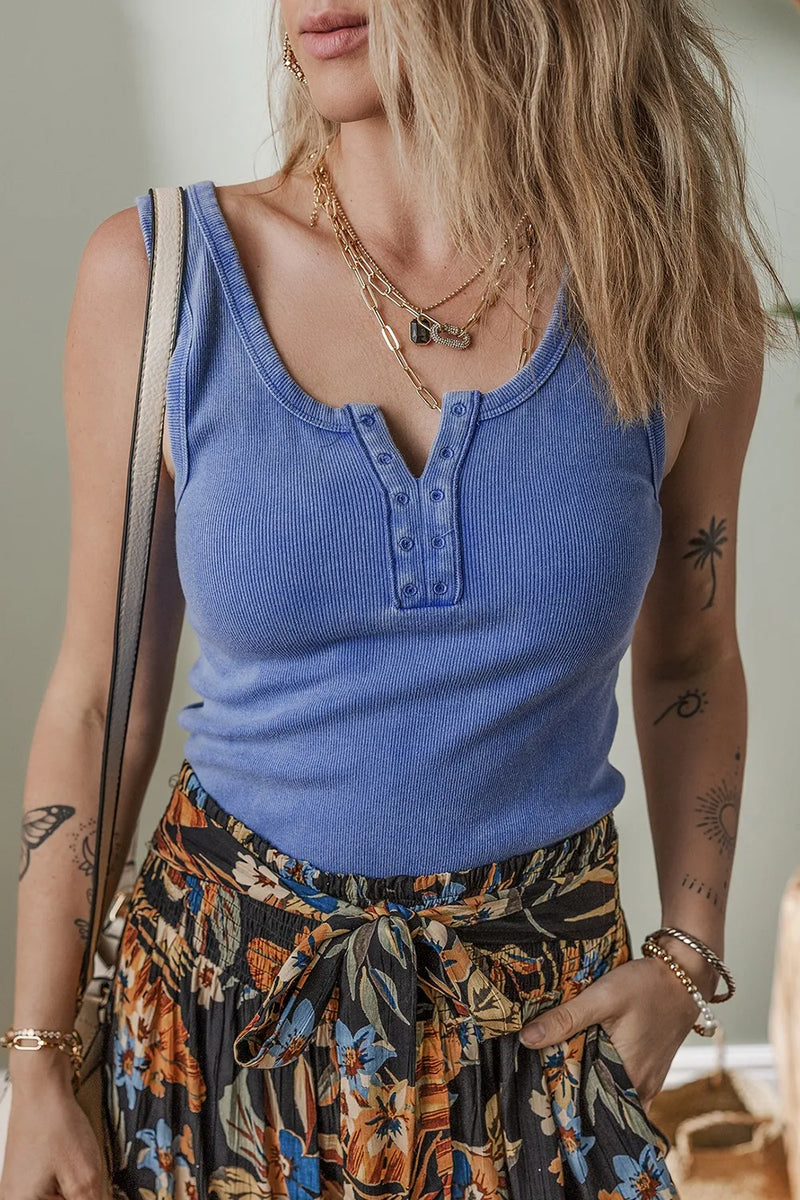 Blue ribbed look tank top with notched neck and faux button holes.