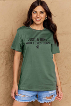 A green t-shirt with 'Just a Girl Who Loves Dogs' text and a pawprint below in white. Round neck and short sleeves, loose fit