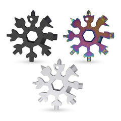 Three snowflake-shaped multi-tool devices in black, silver, and multicolored on a white background.