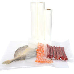 Rolls of vacuum seal bags with a fish and sliced salmon on a white background