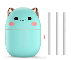 Cute turquoise cat-shaped USB device with pink accents on a white background