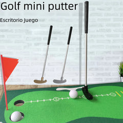 Golf mini putter set on a green mat with a white brick wall background