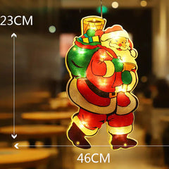 Decorative light-up Santa Claus figure with measurements hanging on a glass store door