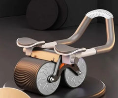 Ab roller with silver wheels on a white background