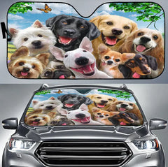 Car sunshade with images of dogs on a car windshield