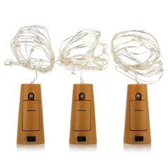 Three string lights with wooden bases on a white background