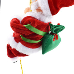 Plush toy resembling a dog in a Santa Claus outfit with a green bag on a white background