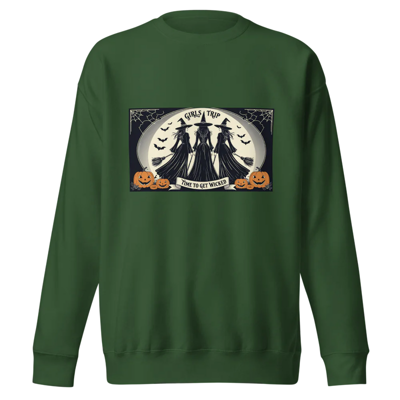 Green sweatshirt with Halloween-themed graphic saying Girls Trip Time to get wicked with three witches about to take off on brooms towards the full moon