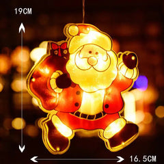 Decorative light-up Santa Claus figure with measurements on a blurred background
