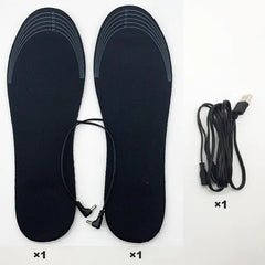 Black heated insoles with USB cable on a white background