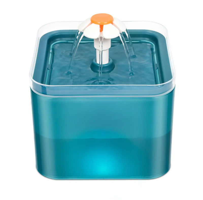Blue pet water fountain with a white and orange top designed like a daisy that is the fountain part, the blue is coming from the LED light, on a white background