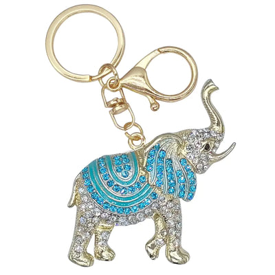 Decorative elephant keychain with blue accents on a white background