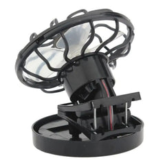 Black portable fan with transparent cage on a white background has clip to mount