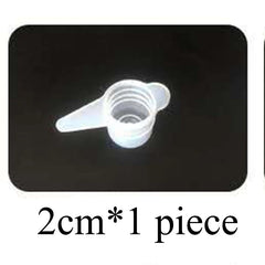 White plastic component on a black background with text indicating size and quantity.