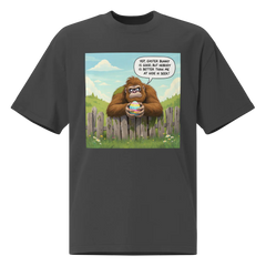 Black t-shirt with a cartoon design of a Sasquatch holding an Easter egg, bubble declares, Yep, Easter Bunny is good, but nobody is better than me at Hide N Seek!