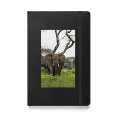 Black notebook with an elephant photo on a white background