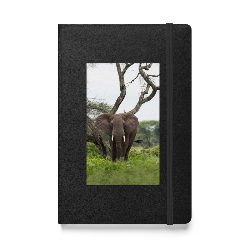 Black notebook with an elephant photo on a white background