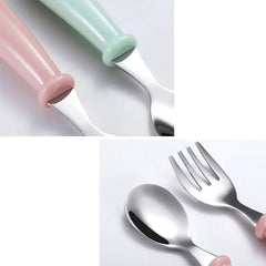 Set of silver cutlery with pink and green handles on a white background