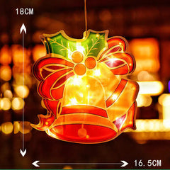 Decorative bell with lights against a blurred festive background