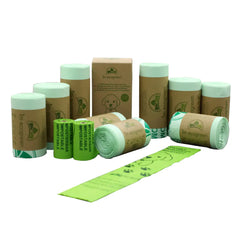 Collection of eco-friendly dog waste bags and packaging on a white background