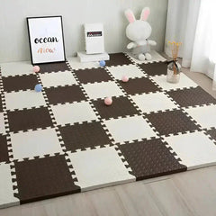 Checkered foam mat on a wooden floor with toys and decor items.