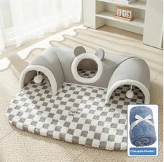 can tunnel playhouse with checkered mat on a carpeted floor