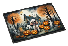 Halloween-themed doormat with Poodles, pumpkins, and a haunted house design.