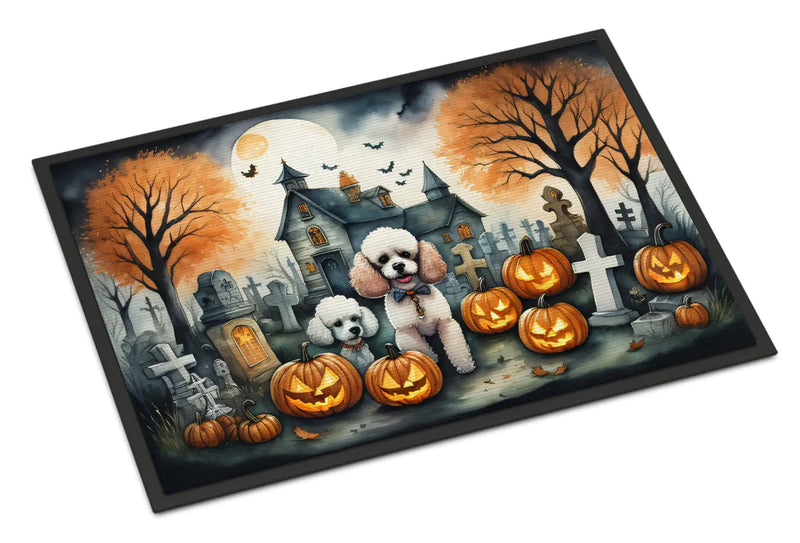 Halloween-themed doormat with Poodles, pumpkins, and a haunted house design.