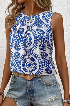Stylish Tank top with blue floral pattern and round neck, darts in front