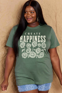 Green Tshirt with round neck and short sleeves, the caption in capital letters says CREATE HAPPINESS, with create being in small letters centered over Happiness. underneath the letters, in white as well, ten flowers arranged in three rows.