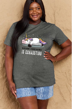 Grey Tshirt with a unicorn laying on it's belly with all legs splayed out and the slogan BEING AWESOME IS EXHAUSTING under it. Round neck and short sleeves