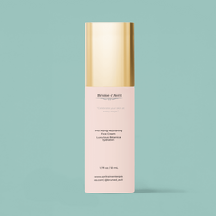 50ml bottle of Brume D'Avril Pro-aging nourishing face cream on a blue background