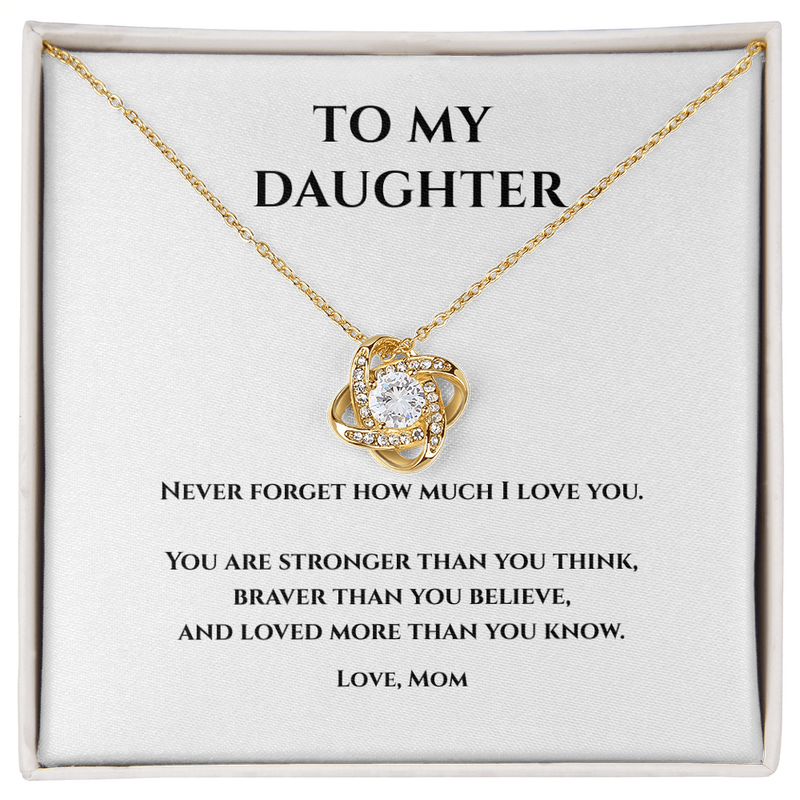 Gold and cubic circonium loveknot necklace w message card that says To My Daughter Never Forget how much I love you. You are stronger than you think, Braver than you believe, and loved more than you know. Love, Mom