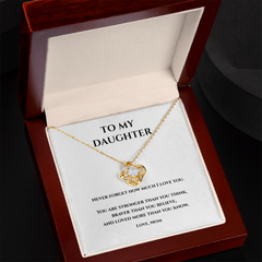 Gold and cubic circonium loveknot  necklace in Luxury Mahagany box w message card that says To My Daughter Never Forget how much I love you. You are stronger than you think, Braver than you believe, and loved more than you know. Love, Mom