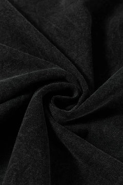 Close-up of dark gray fabric with folds