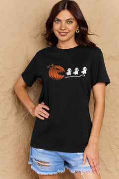 Black Tshirt with Jackolantern appearing to be trying to eat a line of fleeing ghosts