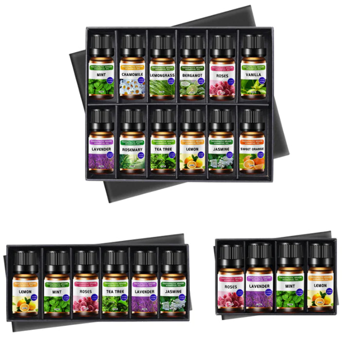 Set of essential oil bottles in a black display box with colorful labels on a white background.