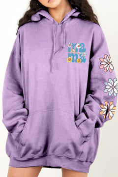 Lilac purple pullover hoodie with hand warmer pocket on front, dropped shoulder long sleeves and body, MAMA on the left side with flowers around the letters and three bigger flowers going down the left arm