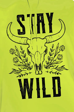 Close up of STAY WILD slogan in Big black letters on the front of this green pullover hoodie. In between the two words is a drawing of a long horned cow skull and some wild flowers around it.