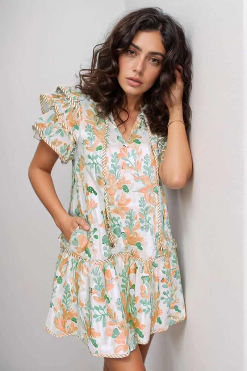 LIght short dress with ruffled sleeves and floral print.