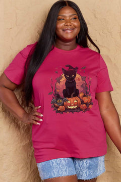 Dark Pink t-shirt with a Halloween design featuring a black cat, pumpkins, leaves and bats in front of full orange moon.