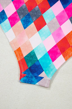 close up of bathing suit bottom, colored diamond design