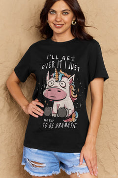 Black Tshirt with round neck and short sleeves, Sad unicorn with big eyes sitting down with slogan  I'LL GET OVER IT I JUST NEED TO BE DRAMATIC