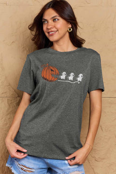 Grey Tshirt with Jackolantern appearing to be trying to eat a line of fleeing ghosts