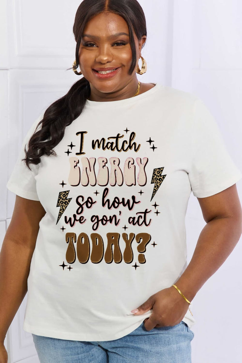 White Tshirt with round neck and short sleeves. The words are surrounded with lightening bolts in a muted leopard print design and little four pointed stars. The words say I match ENERGY so how we gon' act TODAY?  Energy is a cream color with pink accents, and the word today is Chocolate Brown. the other workds are black.