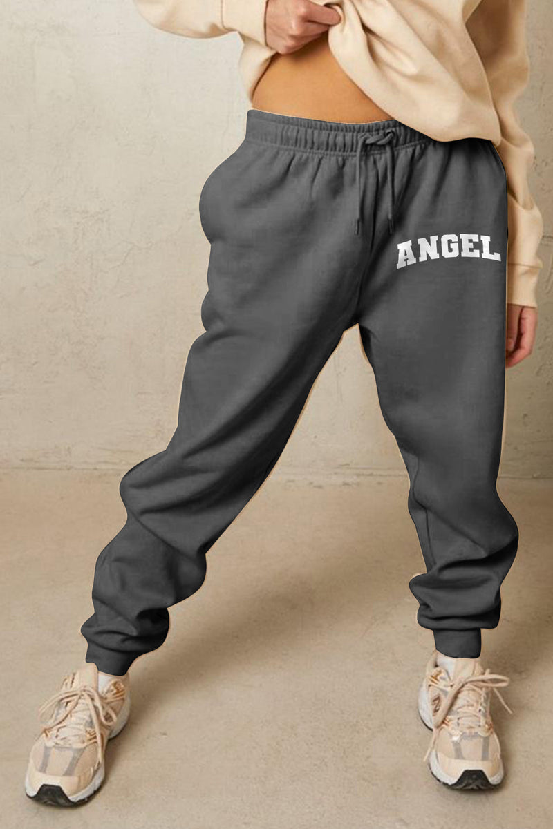 gray sweatpants with 'ANGEL' text at the top of the left leg in white block letters, cuffed pants and elastic waistband with drawstring