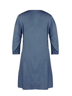 Blue dress with a plain background