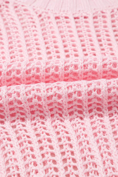 Close-up of pink crocheted fabric