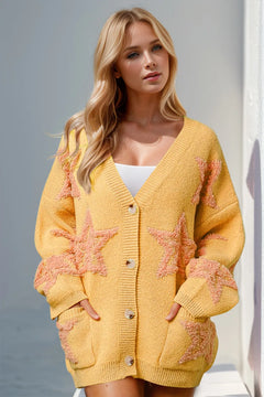 Full Size Button Up Star Pattern Cardigan with deep V neck and 4 oversized tan buttons wide hem around the neck, sleeves, and sweater edges. Solid yellow color with  fuzzy stars on pockets, sleeves and front of shirt in peach color