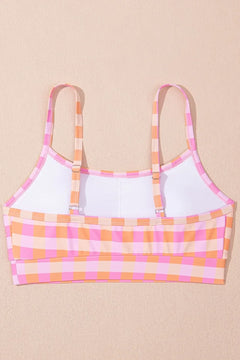 Plaid-patterned bikini top with pink and orange accents